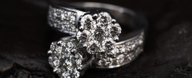 A silver ring encrusted with diamonds