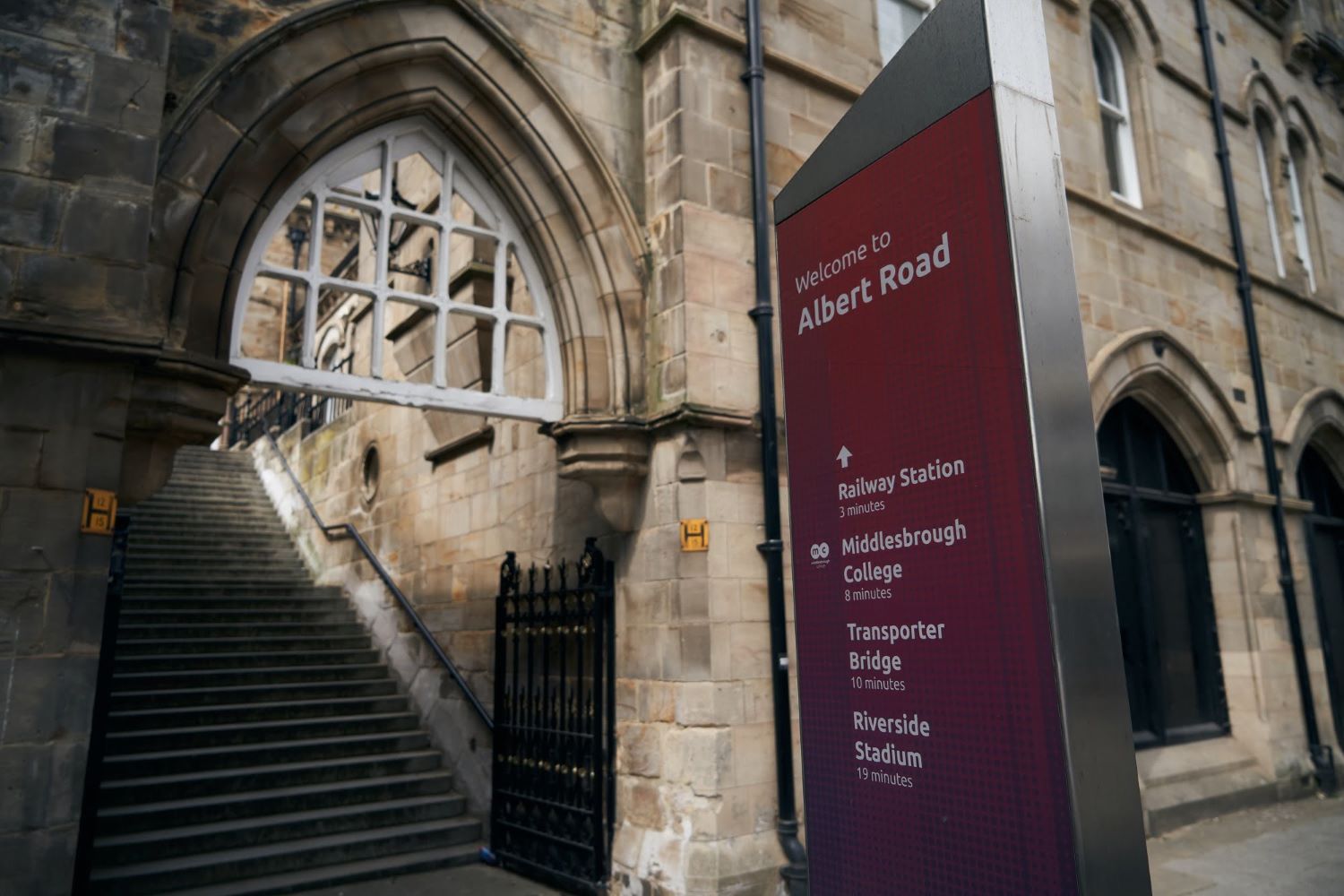 front of Middlesbrough train station with stairs leading up