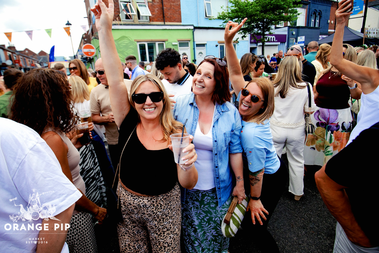 People enjoying the sun at May's Orange Pip 2026