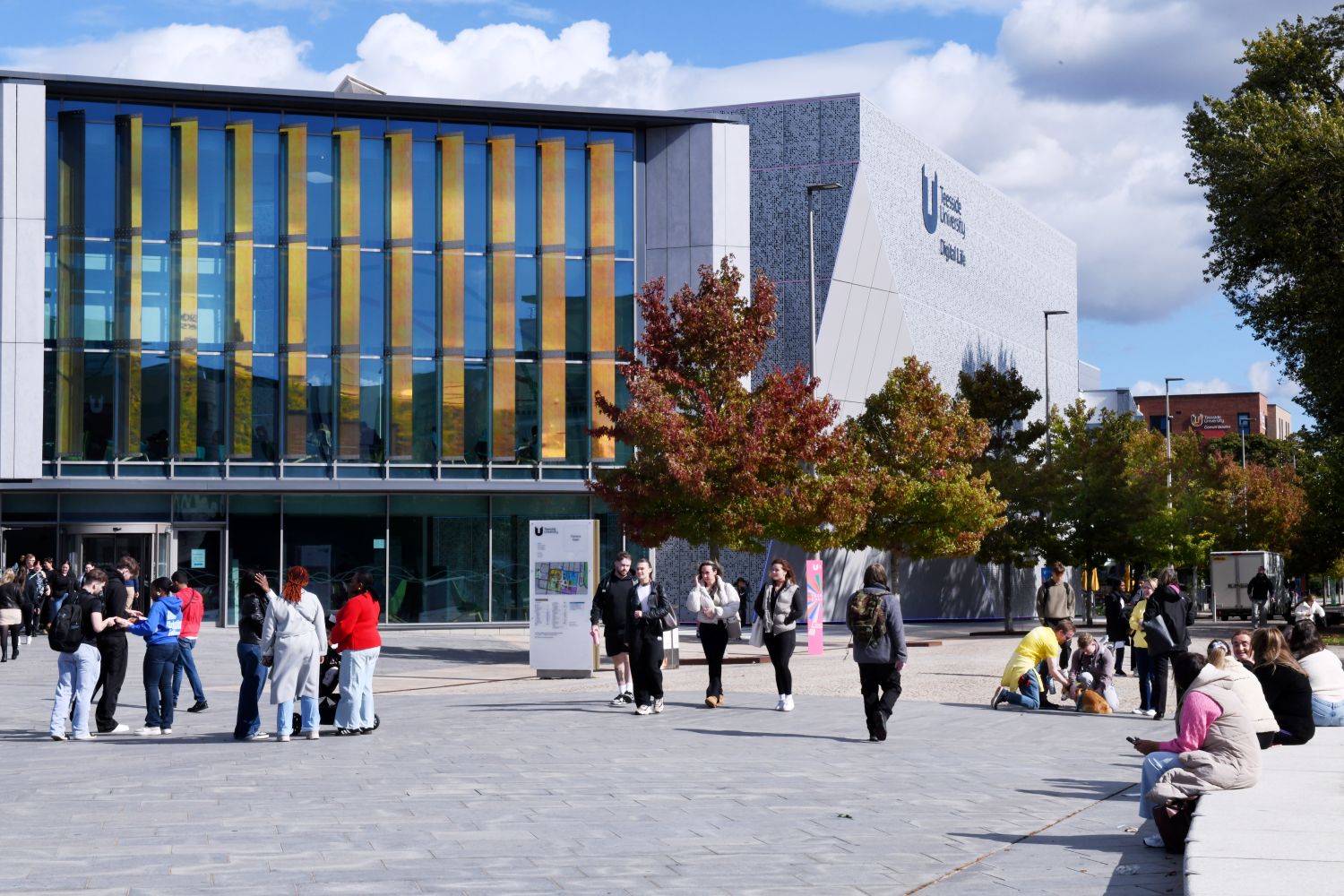 Teesside university freshers outside digital life building campus Teesside university freshers outside digital life building campus